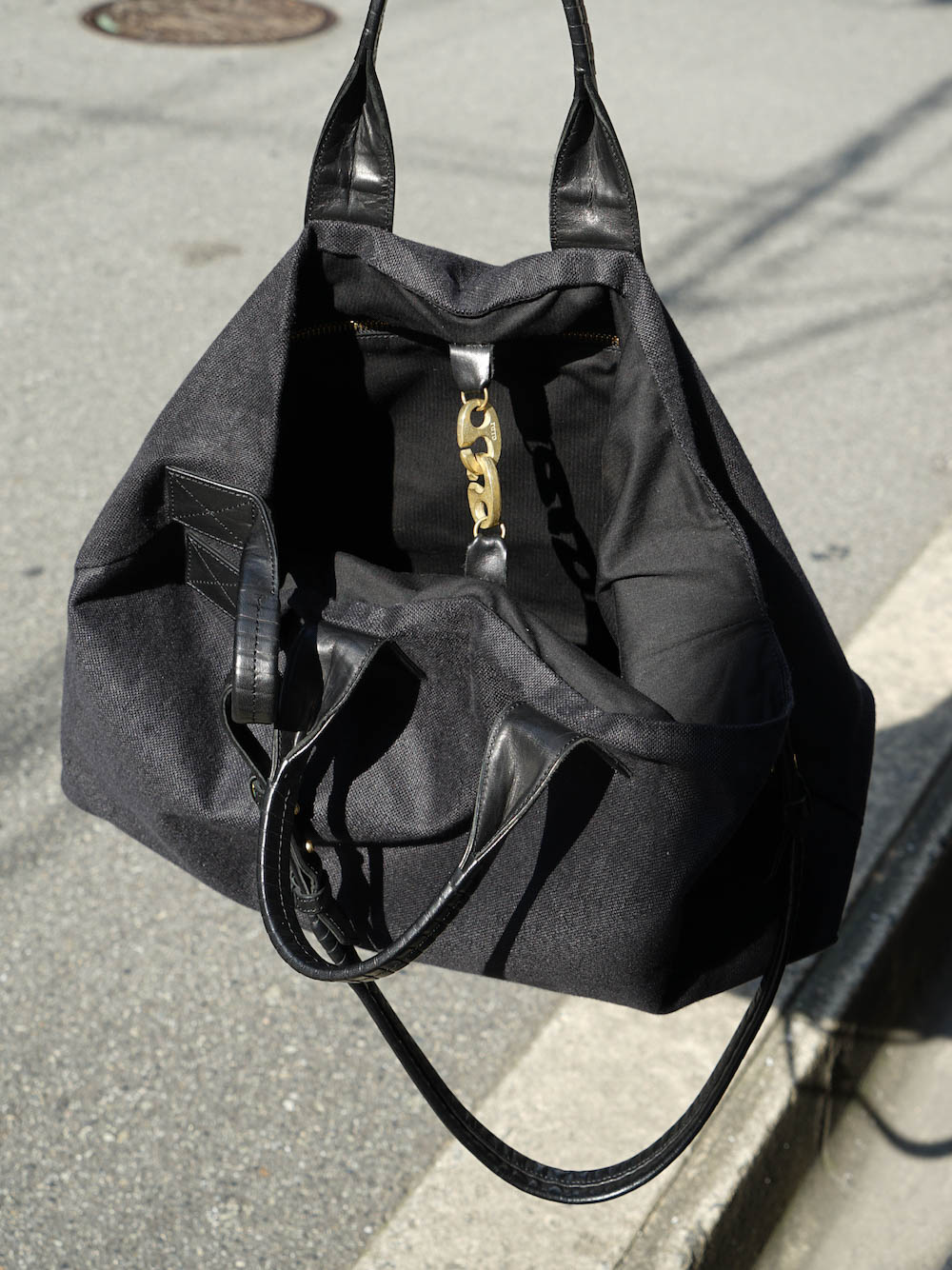 Cornelian Taurus Trace Cover mini shoulder bag in black leather