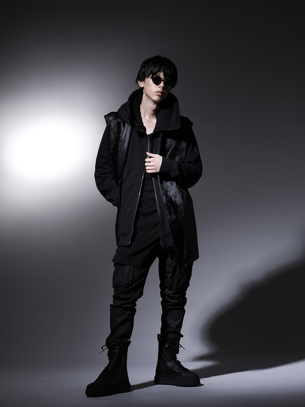 JULIUS / The Viridi-anne / RIGARDS 2022-23AW - A dark, black style that shows the brand's worldview - 797VEM2(Lamb Skin / Cow Hair Vest) 799CUM21-Black(Front Zip Sweat Hoodie Black) 799CUM25-Black(Rib Asymmetry Cutsewn Black) 799PAM25-C(10.5oz Stretch Denim Gas Mask Coated Skinny Pants) 797FWM2-L-Black(Cow Leather Lace Up Sneaker Black) RG2001TVA-Vintage-Black-Black(RIGARDS collaboration sunglasses - Vintage Black+Black / Clear+D.Gray Lens) - 1-001