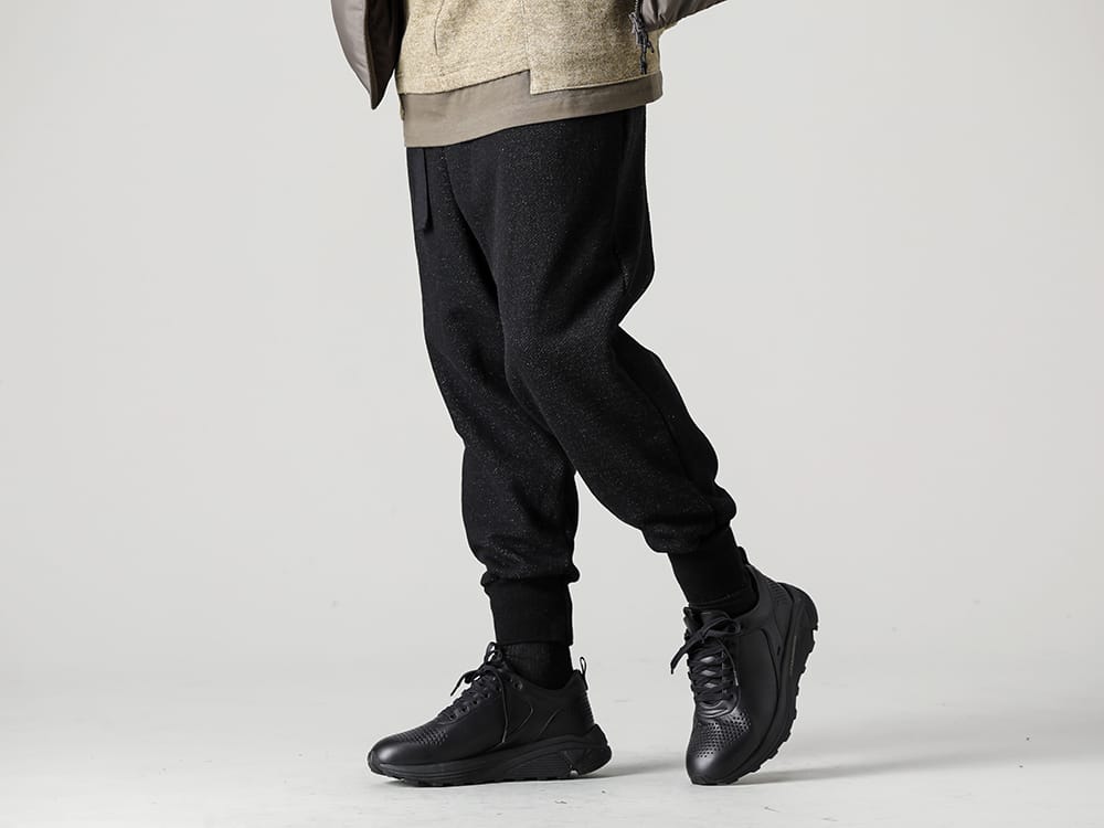 The Viridi-anne 2022-23AW Ribbed pants with a wrap design made with a cotton lining. - VI-3535-04 Wool / Cotton brushed lining Drop Crotch Pants - SCV186C016 Black Night Run Light Black 3-001