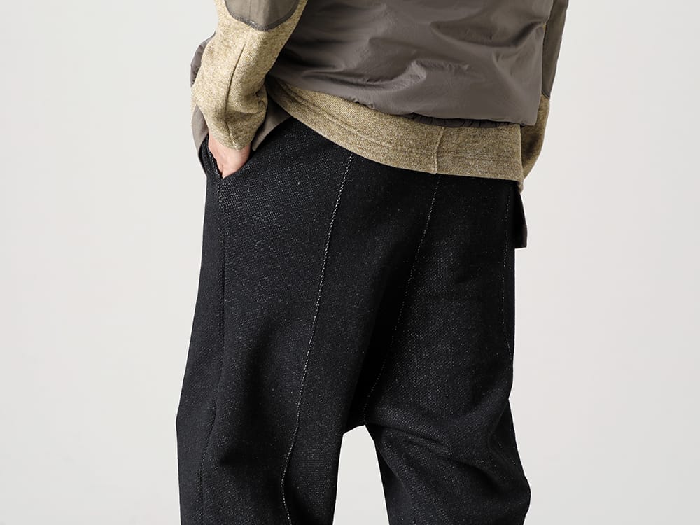 The Viridi-anne 2022-23AW Ribbed pants with a wrap design made with a cotton lining. - VI-3535-04 Wool / Cotton brushed lining Drop Crotch Pants - SCV186C016 Black Night Run Light Black 3-003