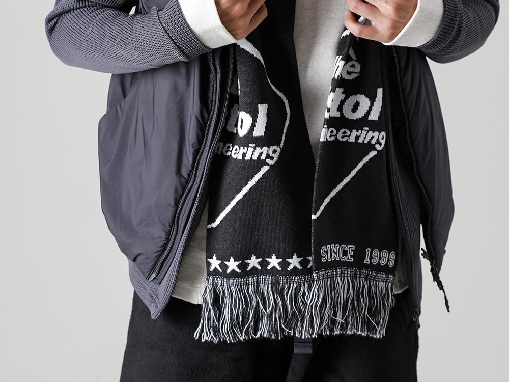 White Mountaineering - ホワイトマウンテニアリング 22-23AW 秋も深まりストールの季節が到来  - WM2273824-WM × F.C.Real Bristol Muffler - MMA-LAN-01-Heating Inner Vest Black 2-002