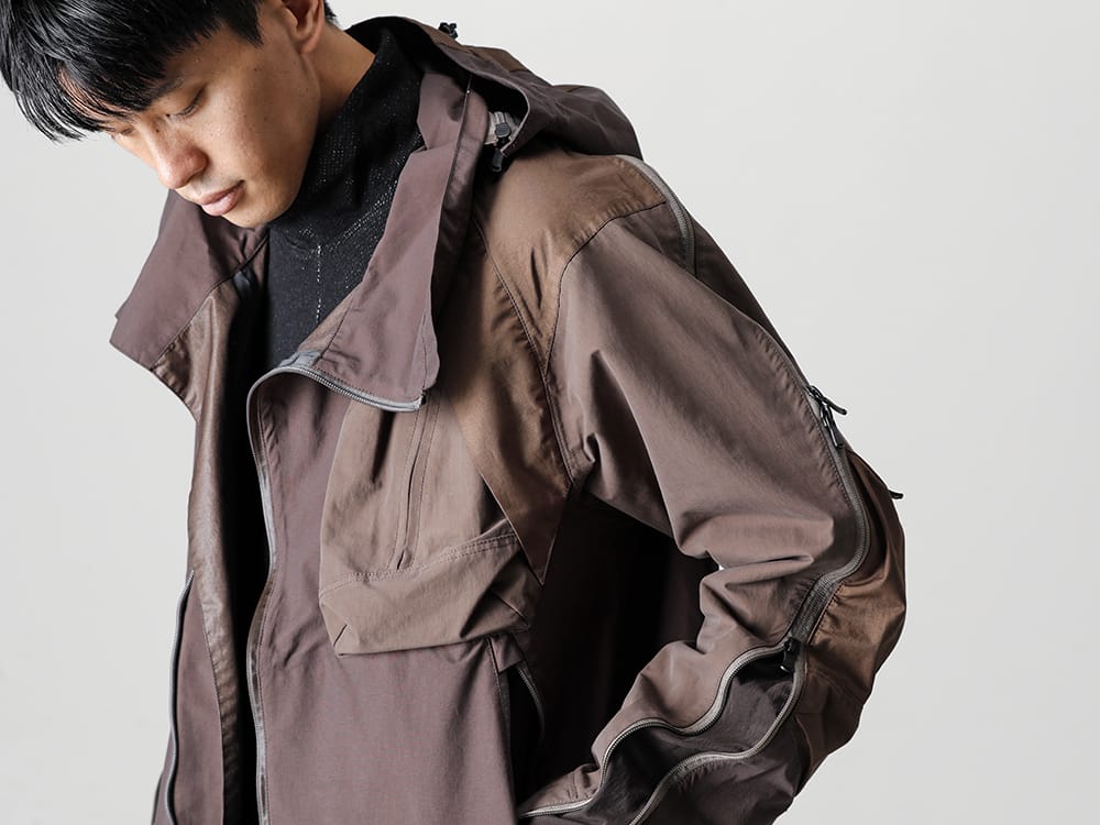 The Viridi-anne 2022-23AW Water-repellent tactical jacket made from a combination of functional materials. A Tactical Jacket that lets you enjoy a mix of materials -  VI-3508-06-Brown-Gray Tactical Jacket Brown Gray - VI-3533-01-Black Wool / Cotton brushed lining High Neck Pullover Black