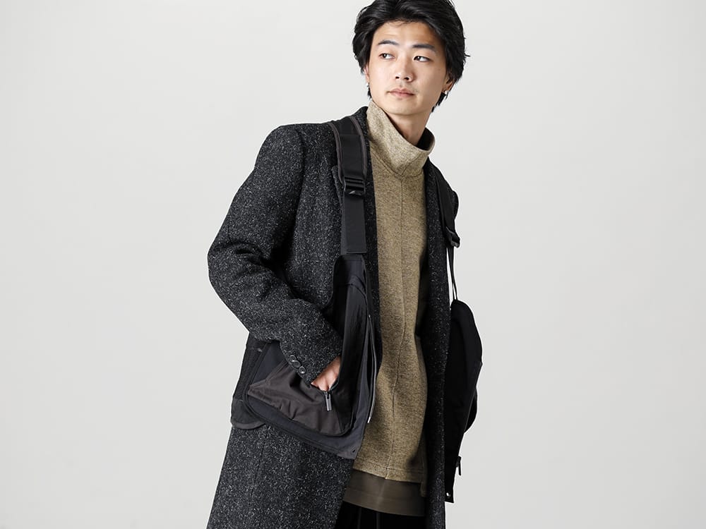 White Mountaineering 2022-23AW Using the form and details of military vests as a reference, this piece was interpreted as an item that can cross both outdoor and town use. BLK Line's signature detail special-edition vest -  BK2273204 BLK Camping Vest - RB-453 Chester Coat - VI-3533-01-Beige Wool / Cotton brushed lining High Neck Pullover Beige