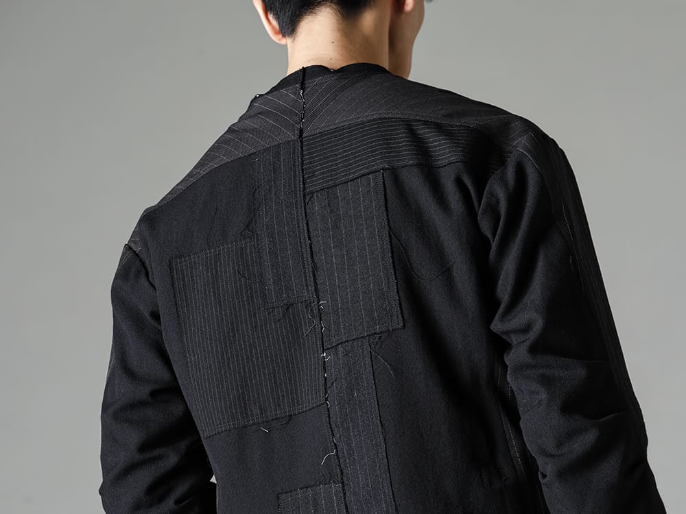 DUELLUM-デュエラム 22−23AW(秋冬) ブランドの初期からデザインのベースにしているパッチワークをアクセントにしたワークテイストのクラシックなジャケット  - DUE-V-058-JAK-パッチドバンドカラージャケット - DUE-V-066-TEE-パッチド ビースト セーター 2-003