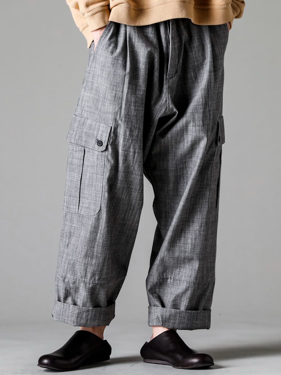 O PROJECT(オー プロジェクト) 23SS(春夏) 無機質で涼しげな表情を持つ墨染めシャンブレー生地 - O15TR3-GREY-SUMI カーゴ トラウザー グレイ スミ シャンブレー 81111-5PO04 JAN JAN VAN ESSCHE X PETROSOLAUM バブーシュ 3-001