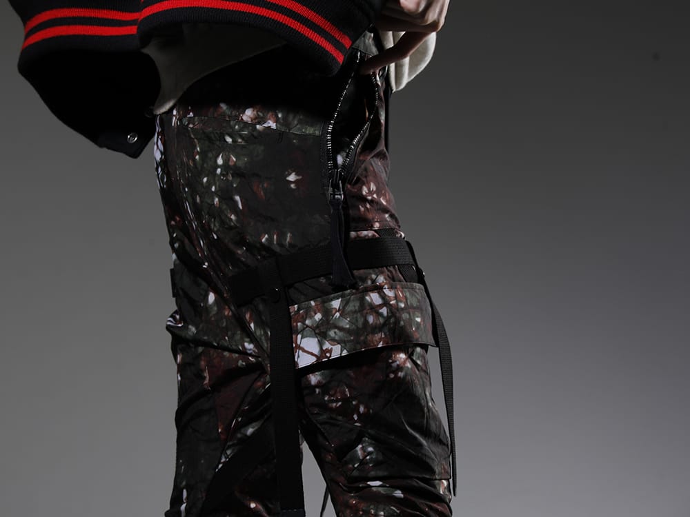 D.HYGEN 2023SS Pants that include the graphic that represents the collection. - ST107-0523S-Moss-Black(Mud-Dyed Nylon Ox-Detachable Cargo Pocket Jog Trousers Moss Black) - 3-005