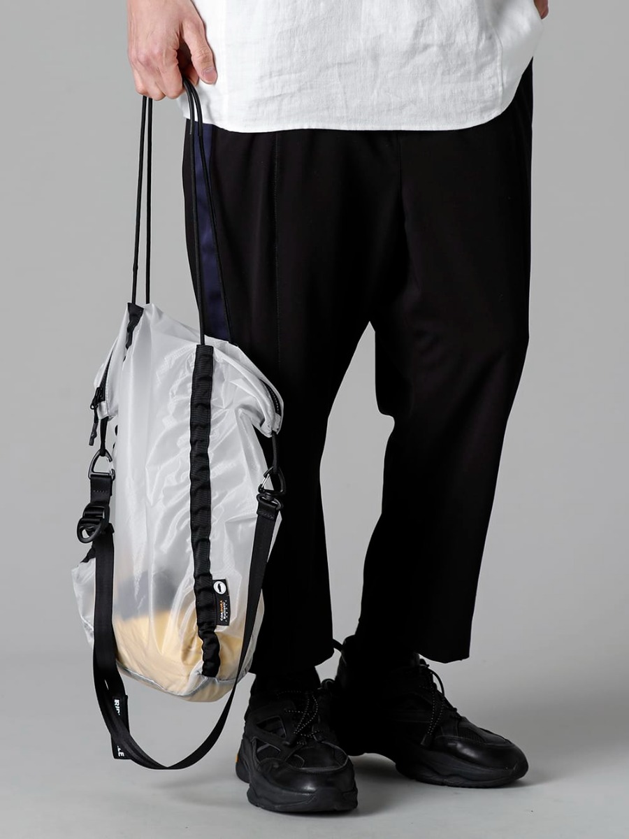 RIPVANWINKLE - リップヴァンウインクル 2023SS 別売りで販売されているRW-552「ストラップ」をショルダーベルトとして使用！ - RW-534 - グルカ パンツ - RW-551 - パッカブル トート - RW-552 - ストラップ - SCV879C001 - フェアー ウィンドライト 3-005