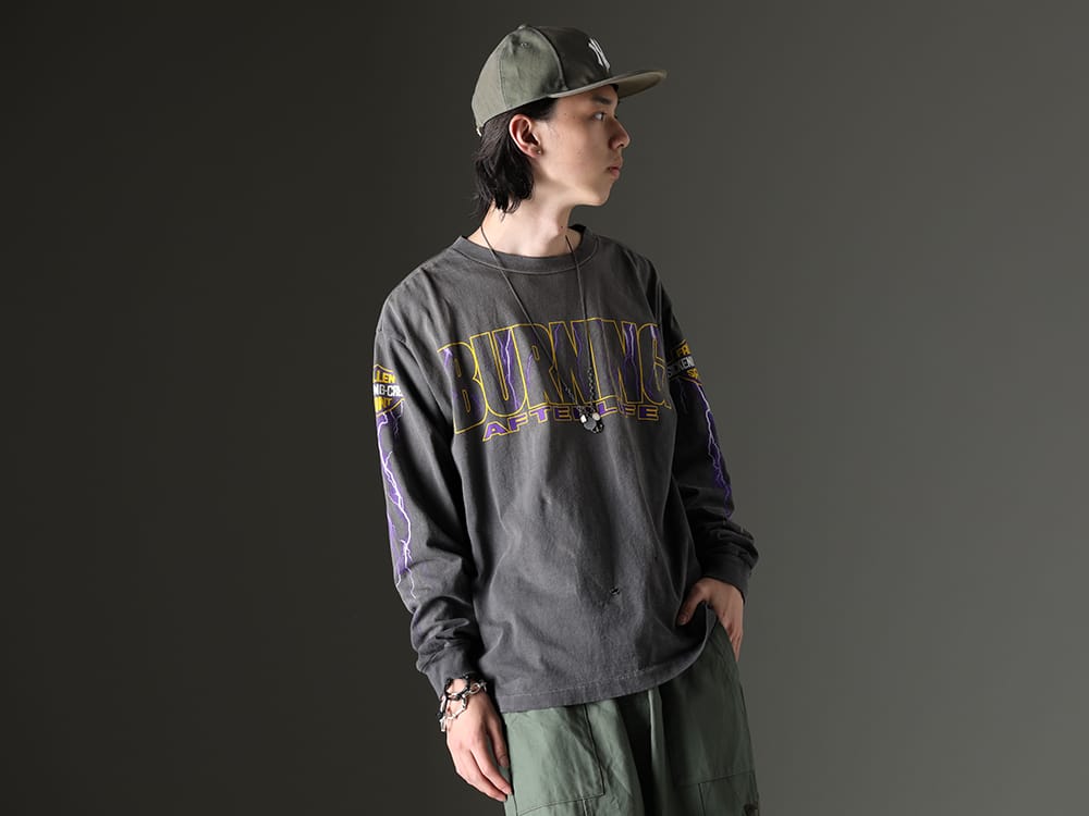 SAINT MICHAEL / NVCLEAR / WERKSTATT:MÜNCHEN / TAKAHIROMIYASHITATheSoloist. 2023SS - Glossy jacket and textured t-shirt - SM-S23-0000-029(EVIL SPILIT Long sleeve T-shirt) NV_002-Vintage-Green(NV LOGO FR ARMY COTTON CAP VINTAGE GREEN) M3501(Necklace charms) sa.0037SS23-Black(bone shaped carabiner bracelet.-L- Black) sa.0037SS23-Silver(bone shaped carabiner bracelet.-L- Silver) - 2-008