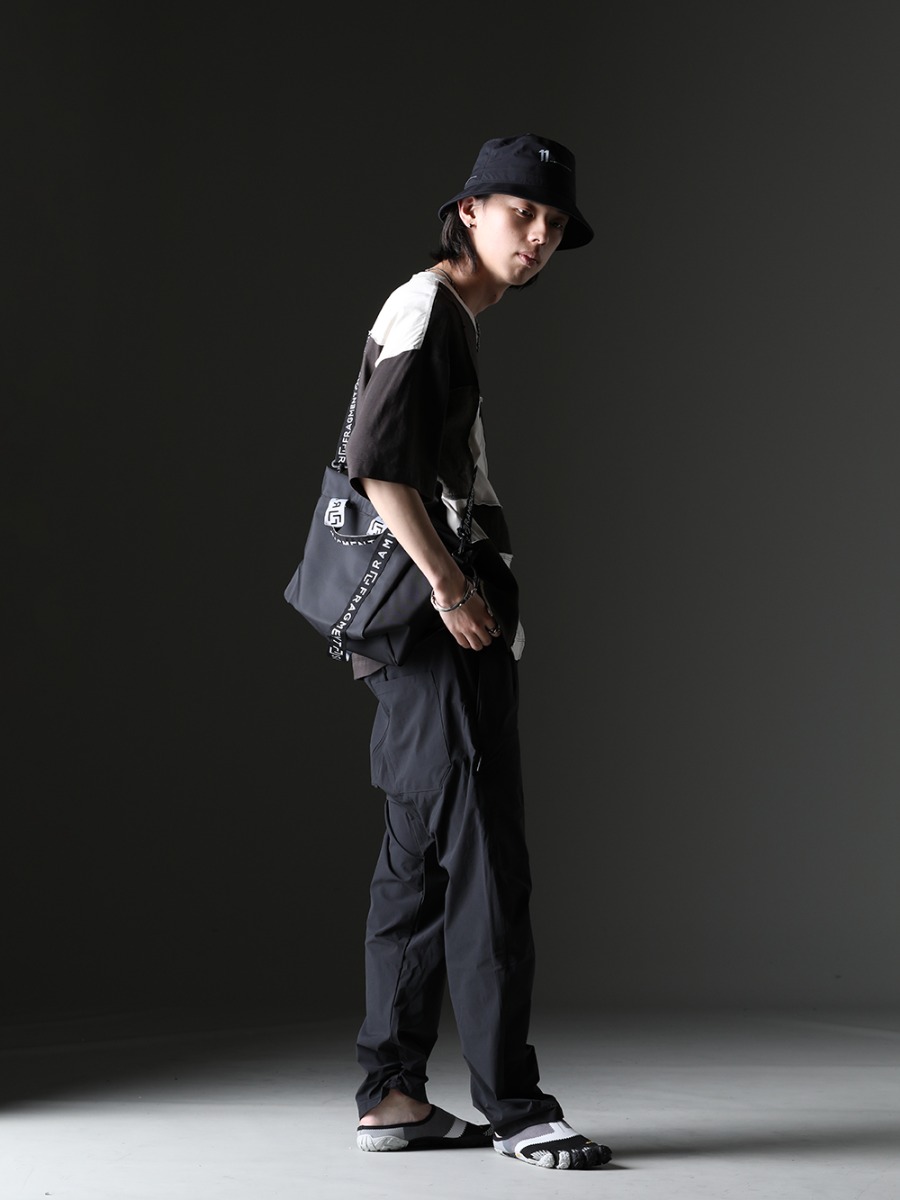 ZIGGY CHEN / 11 by Boris Bidjan Saberi / RAMIDUS / WERKSTATT:MÜNCHEN / TAKAHIROMIYASHITATheSoloist. - The look is rough, yet has a sense of individuality. - 0M2310212(Assymetrical Patchwork T-Shirt) ST-BUCKET-GORE-TEX-11XNE(11 by BBS × New Era - BUCKET GORE-TEX) B008041(RAMIDUS 2WAY POUCH (M)) M3851(Choker Faith Love Hope) 14M2591(Bracelet Tag) 15M1001(Signet Ring Oval Hammered) 15M2633(Bracelet Wild Links Closure) M2211(Bracelet Crossed) 14M1370(Ring Mixed Chain) P22-F1343-Black(P22 F1343 Black) sf.0008SS23-Black(nin-sabo-soloist.(fivefinger slip on) Black) - 1-002