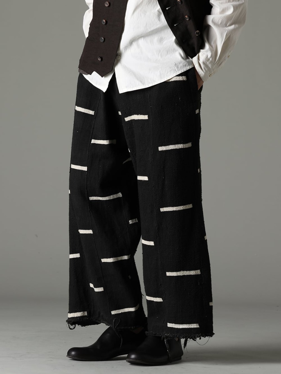 OLUBIYI THOMAS PETROSOLAUM 23SS Unique design and indigenous textiles with African attractiveness  -  2507.94-1 Wide leg drawstring trousers #1 81111-5PO04 JAN JAN VAN ESSCHE X PETROSOLAUM babouche 2-001