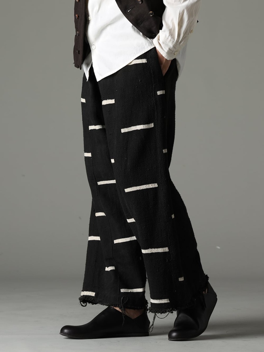 OLUBIYI THOMAS PETROSOLAUM 23SS Unique design and indigenous textiles with African attractiveness  -  2507.94-1 Wide leg drawstring trousers #1 81111-5PO04 JAN JAN VAN ESSCHE X PETROSOLAUM babouche 2-002